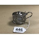 AN EDWARDIAN SILVER MUSTARD POT OF OVAL FORM WITH PIERCED AND CAST SWAGS, ORIGINAL BLUE GLASS LINER,