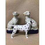 A PAIR OF STAFFORDSHIRE SEATED LABRADOR DOGS, 20CM HIGH, TOGETHER WITH A BESWICK DALMATIAN