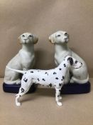 A PAIR OF STAFFORDSHIRE SEATED LABRADOR DOGS, 20CM HIGH, TOGETHER WITH A BESWICK DALMATIAN