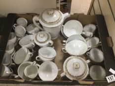 A FRENCH LIMOGES PORCELAIN TEA SET WITH GILT DECORATION, TEA CUPS ONLY