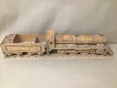 AN UNUSUAL MODEL OF A STEAM LOCOMOTIVE MADE OUT OF MATCHSTICKS