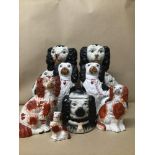 A COLLECTION OF STAFFORDSHIRE SPANIELS INCLUDING TWO PAIRS