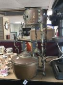 AN UNUSUALLY LARGE LATE 19TH/EARLY 20TH CENTURY COPPER AND BRASS TEAPOT ON STAND (AF)