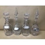 TWO PAIRS OF VICTORIAN CUT GLASS DECANTERS, EACH ADORNED WITH A SPIRIT LABEL, ONE BEING SILVER,