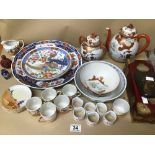 A QUANTITY OF CHINESE AND JAPANESE PORCELAIN, INCLUDING TEAPOT, CUPS, WALL PLATES AND MORE