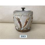 AN ART DECO BISCUIT BARREL WITH EMBOSSED DECORATION OF PENGUINS, 13.5CM HIGH