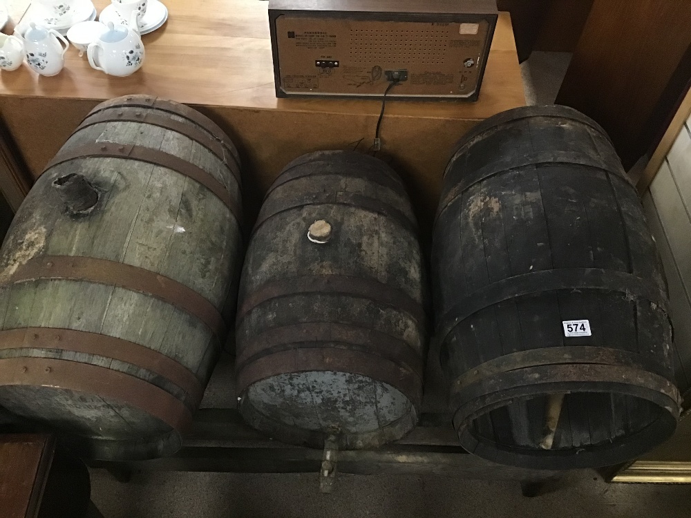 THREE VINTAGE FRENCH WOODEN BARRELS ON WOODEN STANDS