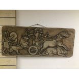 A PLASTER PLAQUE OF A ROMAN SCENE