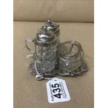 A VICTORIAN SILVER CRUET SET WITH ENGRAVED, TREFOIL BASE, COMPRISING TWO SILVER TOPPED GLASS BOTTLES