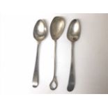 TWO GEORGE III SILVER TEASPOONS, TOGETHER WITH A SILVER PRESERVE SPOON, 44G