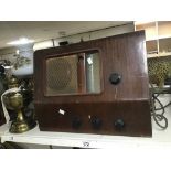 A LARGE VINTAGE MURPHY RADIO, WOODEN CASED, 53CM WIDE