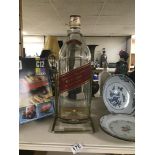 A LARGE JOHNNIE WALKER RED LABEL OLD SCOTCH WHISKY EMPTY BOTTLE ON METAL STAND, 4.5 LITRES