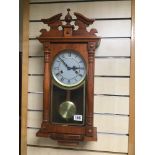 A MAHOGANY CASED WALL CLOCK WITH PENDULUM, 66CM HIGH