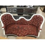 A BUTTON BACK TWO SEATER VICTORIAN LOVE SEAT