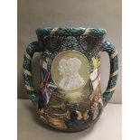 A LIMITED EDITION COMMEMORATIVE ROYAL DOULTON LOVING CUP FOR THE SILVER JUBILEE KING GEORGE V AND
