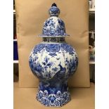 AN UNUSUALLY LARGE DUTCH DELFT BLUE AND WHITE VASE AND COVER, HIGHLY DECORATED THROUGHOUT WITH