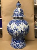 AN UNUSUALLY LARGE DUTCH DELFT BLUE AND WHITE VASE AND COVER, HIGHLY DECORATED THROUGHOUT WITH