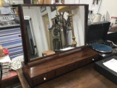 A REGENCY MAHOGANY DRESSING SWING MIRROR WITH IVORY BUTTON HANDLES