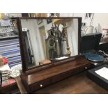 A REGENCY MAHOGANY DRESSING SWING MIRROR WITH IVORY BUTTON HANDLES