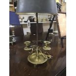 A LATE 19TH CENTURY CANDLE LAMP IN BRASS