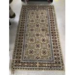 A VINTAGE MORROCAN RUG 224 X 122CMS