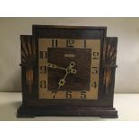 A 20TH CENTURY ART DECO OAK CASED MANTLE CLOCK BY JAMES WALKER LTD, DIAL OF SQUARE FORM WITH