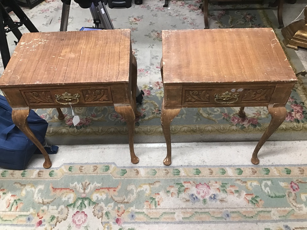 A PAIR OF BEDSIDE CHESTS ON CARBIO LEGS