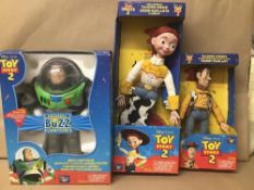 THREE DISNEY PIXAR TOY STORY 2 TOYS BY THINKWAY, COMPRISING WOODY, JESSIE AND BUZZ LIGHTYEAR, ALL