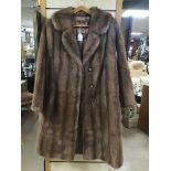 A VINTAGE LONG MUSQUASH FUR COAT