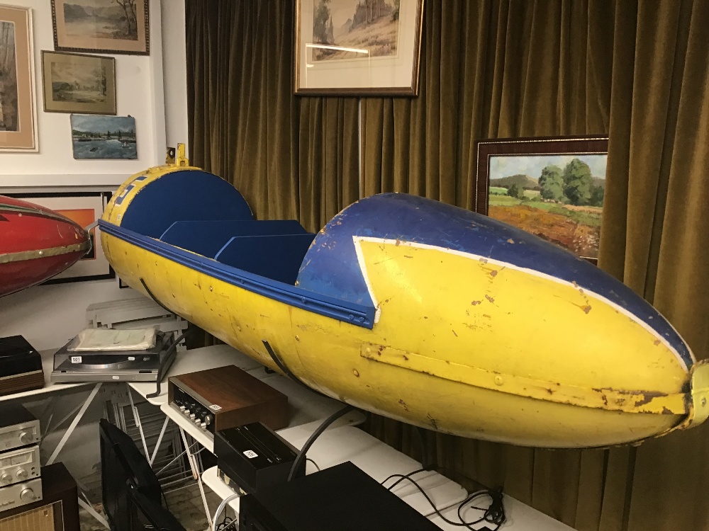 A VINTAGE YELLOW AND BLUE FIBREGLASS AND WOOD FAIRGROUND ROCKET RIDE 1950'S - Image 2 of 3