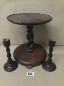 A VICTORIAN WOODEN BARLEY TWIST STAND WITH A PAIR OF BARLEY TWIST CANDLE STICKS