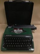 A SILVER-REED SILVERETTE II TYPEWRITER WITH LID