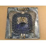 LISA LARSON FOR GUSTAVSBERG, A PORCELAIN WALL PLAQUE OF SQUARE FORM DEPICTING A REGAL KING LIKE
