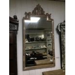 AN ORNATE WALL MIRROR 56 X 112CMS