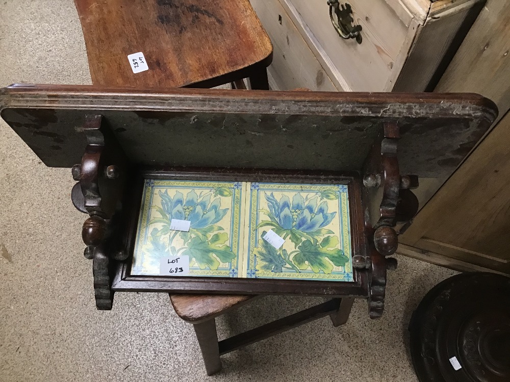 A VINTAGE BRACKET SHELF WITH TWO TILES