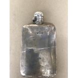 A LATE VICTORIAN SILVER HIP FLASK WITH DETACHABLE SILVER CUP, HALLMARKED CHESTER 1897 BY STOKES &