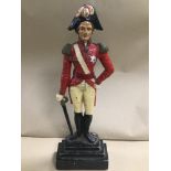 A HEAVY VICTORIAN CAST IRON DOORSTOP DEPICTING ADMIRAL LORD NELSON IN PERIOD DRESS, HAND PAINTED