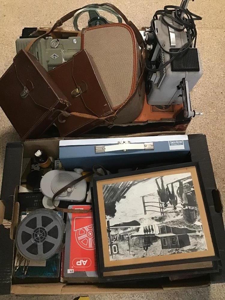 A LARGE ASSORTMENT OF EARLY FILM CAMERAS AND ACCESSORIES, INCLUDING FILM REELS, EUMIG P8 AUTOMATIC