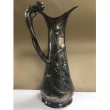 A LATE 19TH/EARLY 20TH CENTURY ART NOUVEAU WMF BRITANNIA METAL POURING JUG, THE HANDLE FORMED AS A