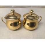 TWO FRENCH PORCELAINE DE PARIS GOLD PAINTED LIDDED CUPS, ONE WITH ORIGINAL LABEL