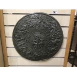AN UNUSUAL BRONZED RESIN WALL PLAQUE OF CIRCULAR FORM SHOWING A BATTLE, 45CM DIAMETER