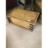 A SMALL VICTORIAN PINE CHEST WITH HANDLES AND METAL BANDING 71 X 40 X 35CMS