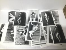 A QUANTITY OF BLACK AND WHITE PHOTOGRAPHS OF SEMI NUDE WOMEN