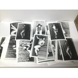 A QUANTITY OF BLACK AND WHITE PHOTOGRAPHS OF SEMI NUDE WOMEN