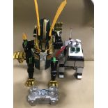 A POWER RANGERS DRAGON ZORD TOY, TOGETHER WITH A MEGA-BYTE DOG