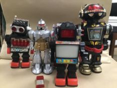 A GROUP OF FIVE VINTAGE ROBOTS FROM HONG KONG