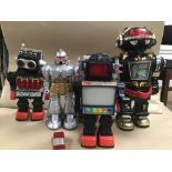 A GROUP OF FIVE VINTAGE ROBOTS FROM HONG KONG