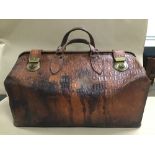 AN EARLY 20TH CENTURY CROCODILE LEATHER GLADSTONE DOCTORS BAG BY PYRAMID HIGH GRADE TRAVEL GOODS,