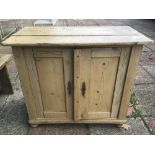 A VINTAGE PINE CUPBOARD WITH INTERNAL SHELF