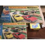A BOXED MATCHBOX MOTORWAY SET WITH MOTORWAY EXTENSION AND POWER PACK